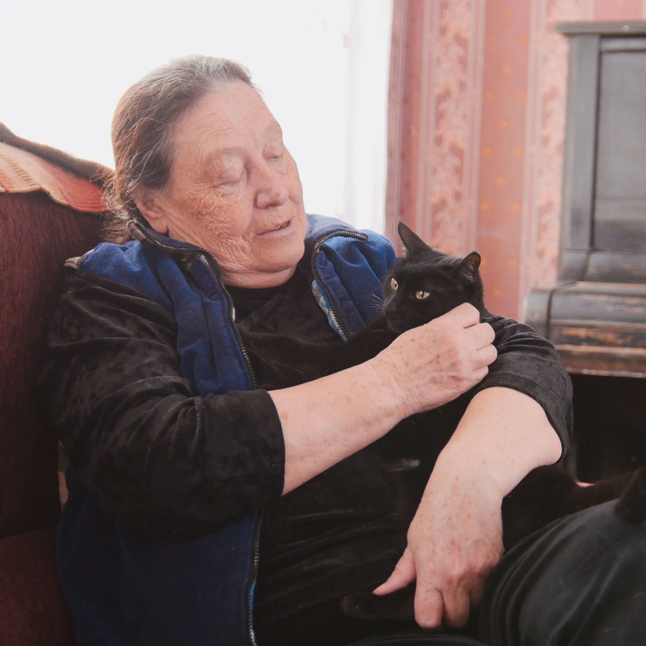 Senior Woman with Cat